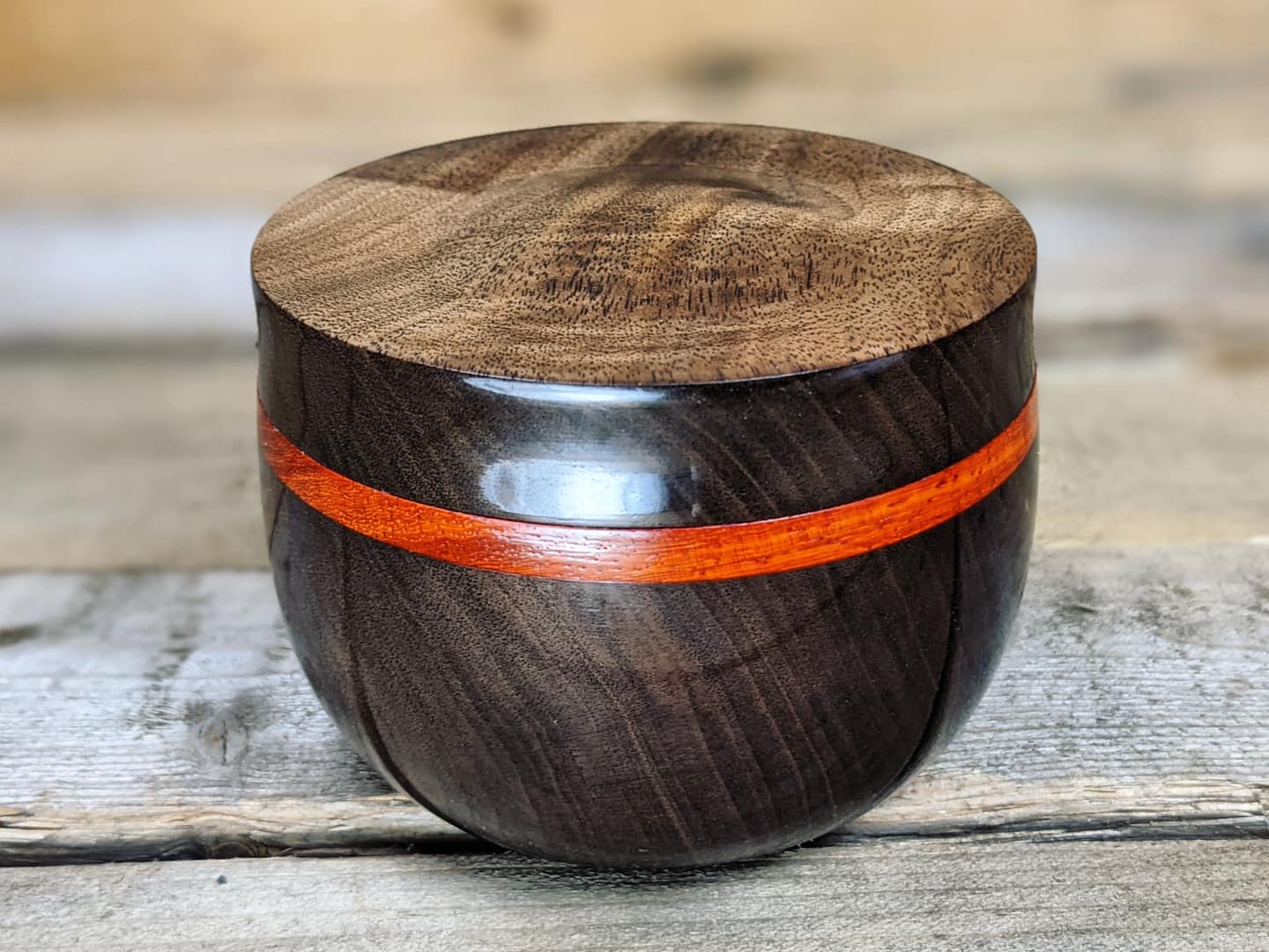 Black walnut lidded pot with padauk collar