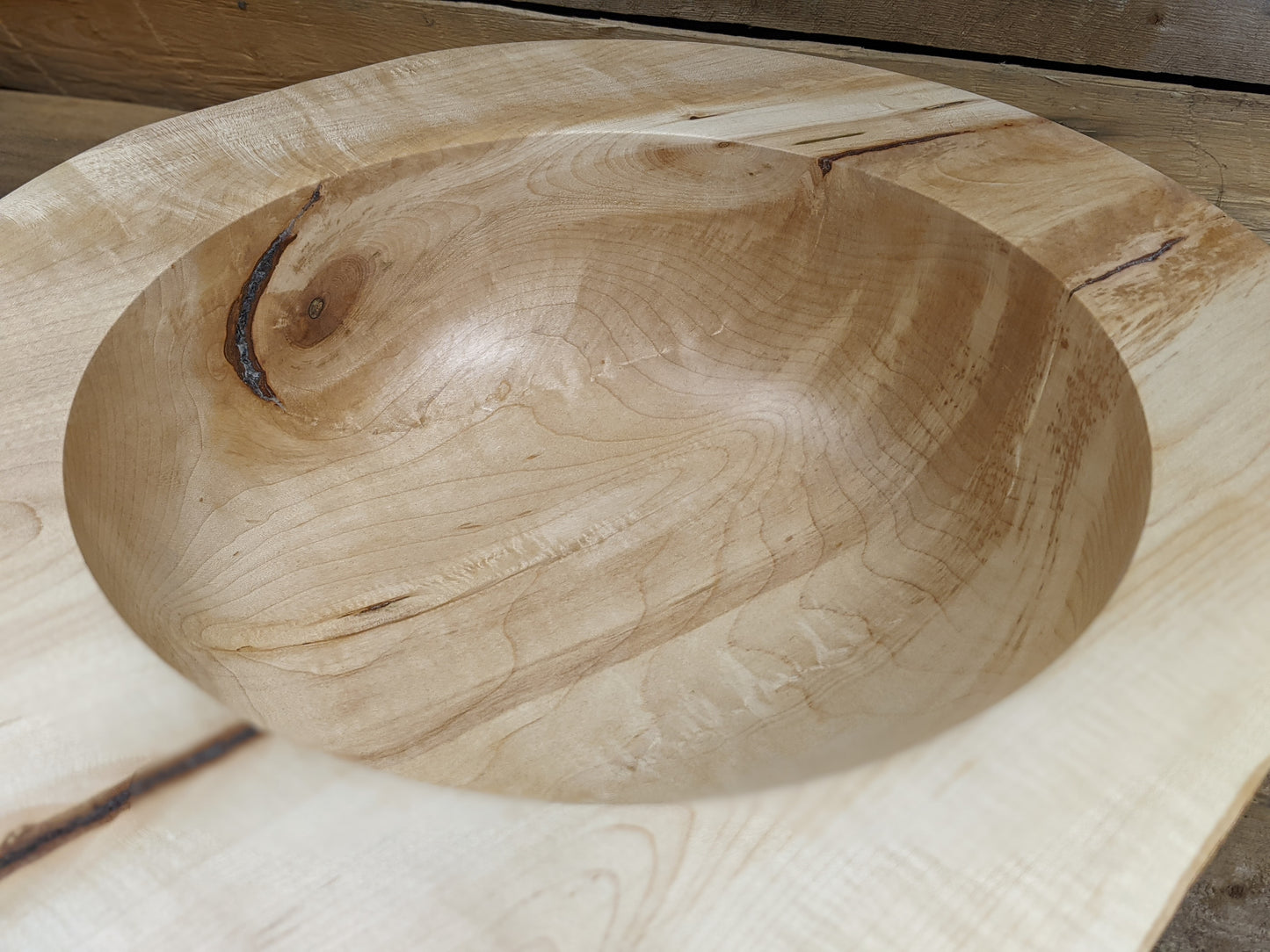 Natural edge wide rimmed bell bottomed bowl