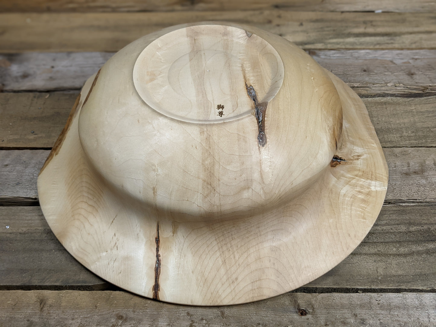 Natural edge wide rimmed bell bottomed bowl