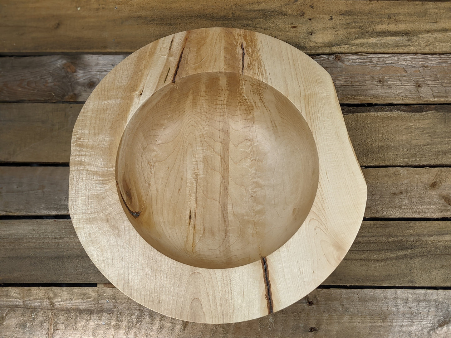 Natural edge wide rimmed bell bottomed bowl