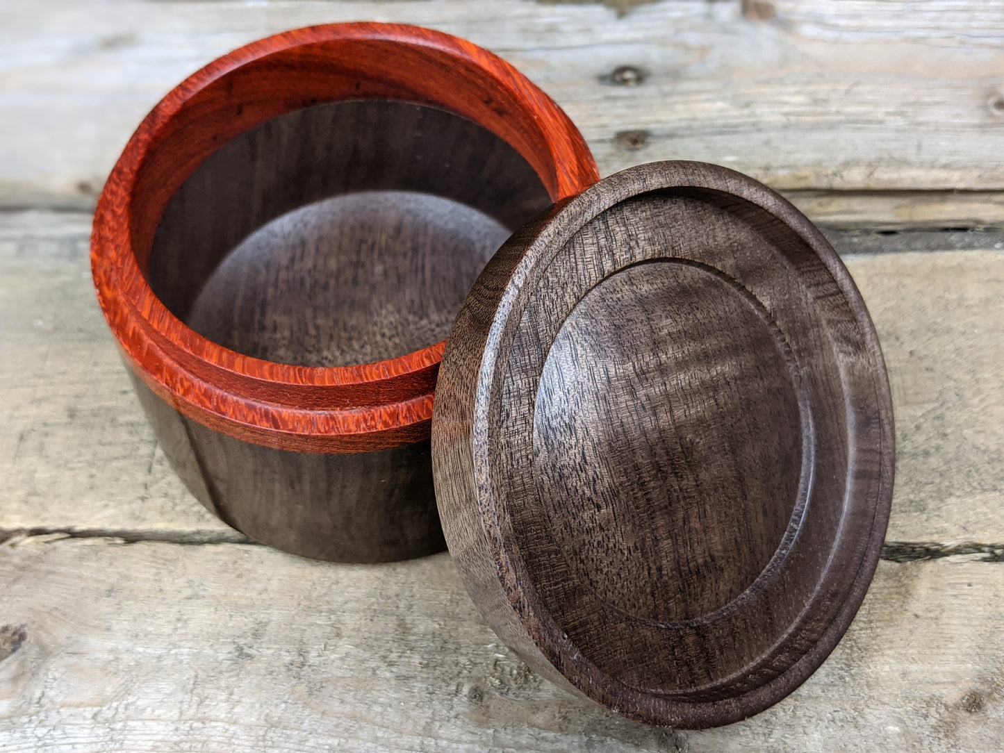 Black walnut lidded pot with padauk collar