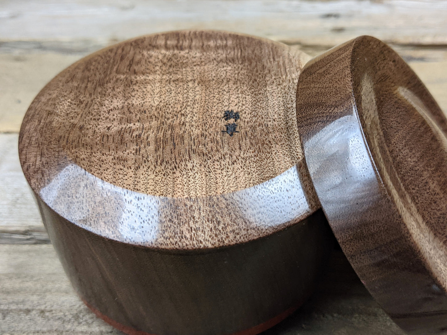 Black walnut lidded pot with padauk collar