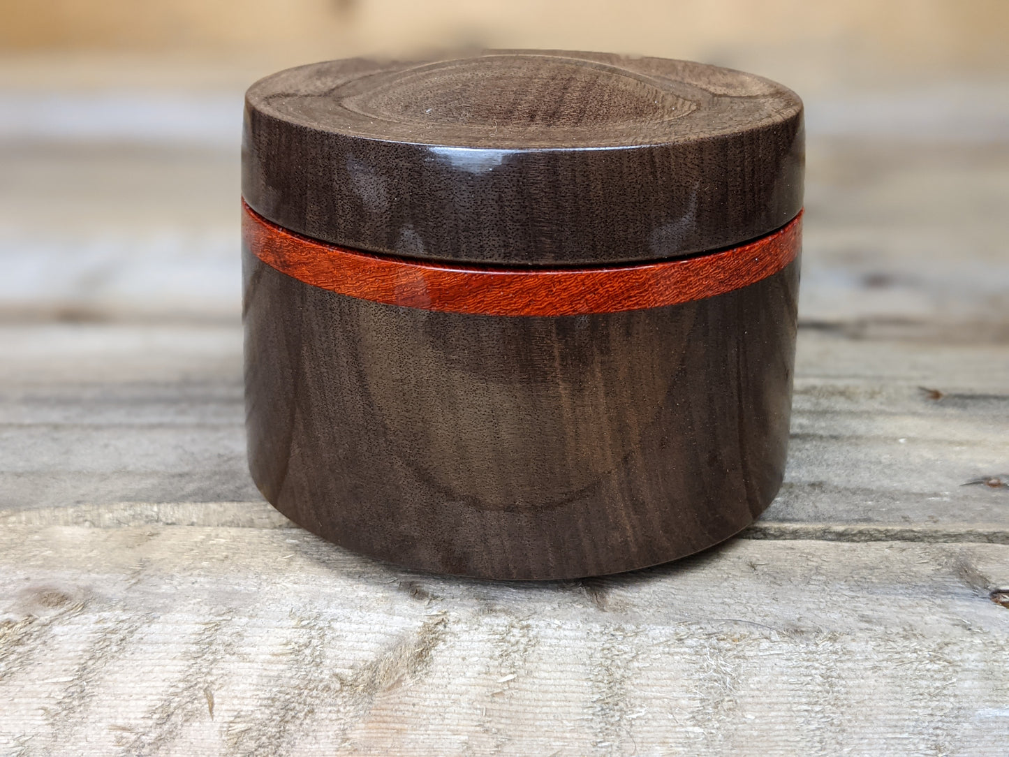 Black walnut lidded pot with padauk collar