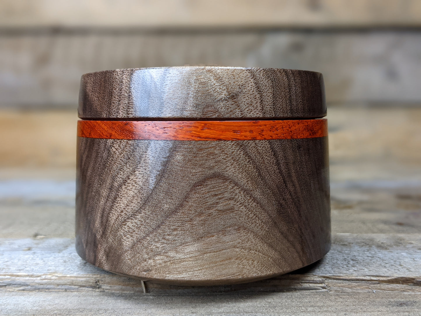 Black walnut lidded pot with padauk collar