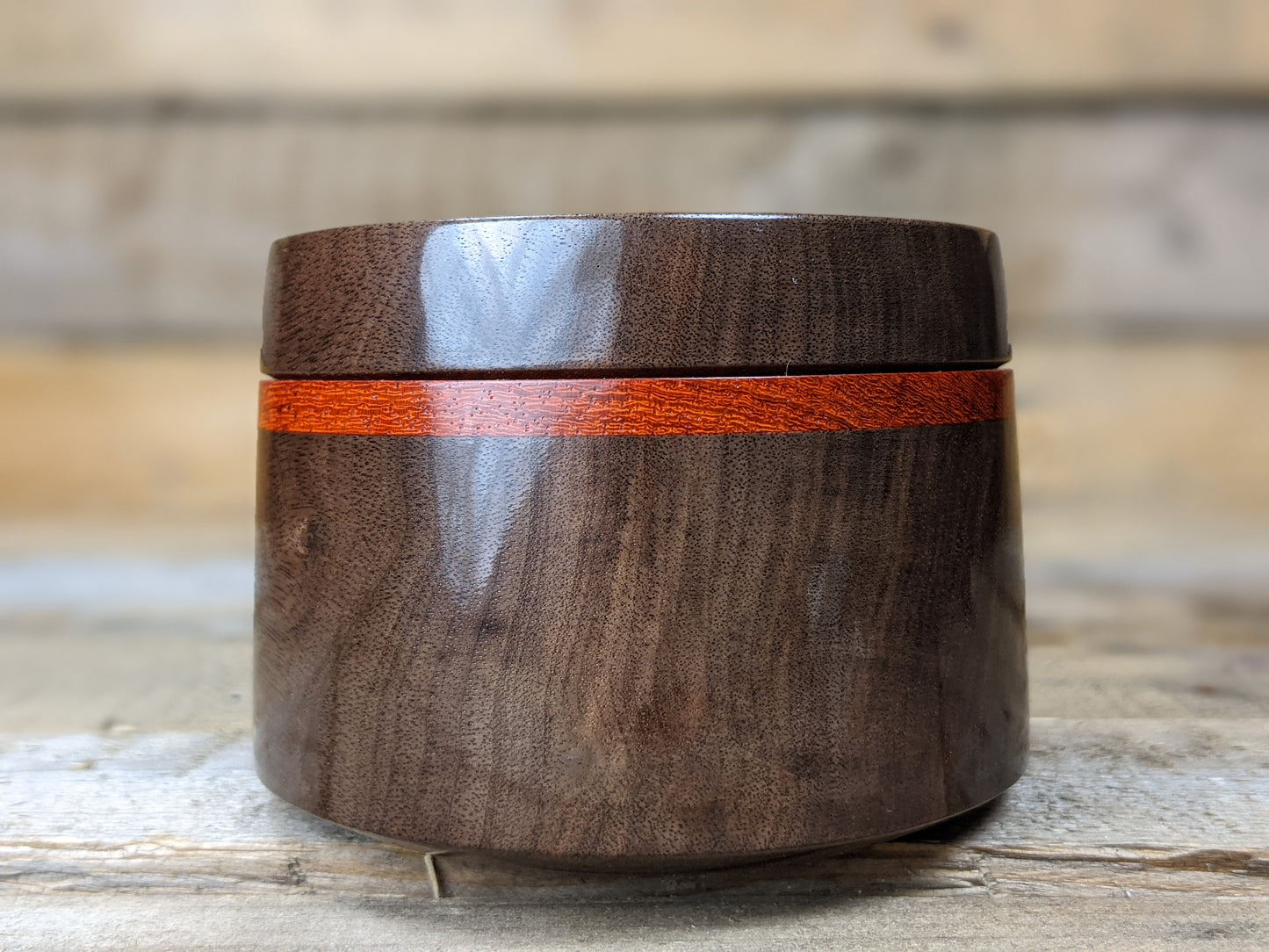 Black walnut lidded pot with padauk collar