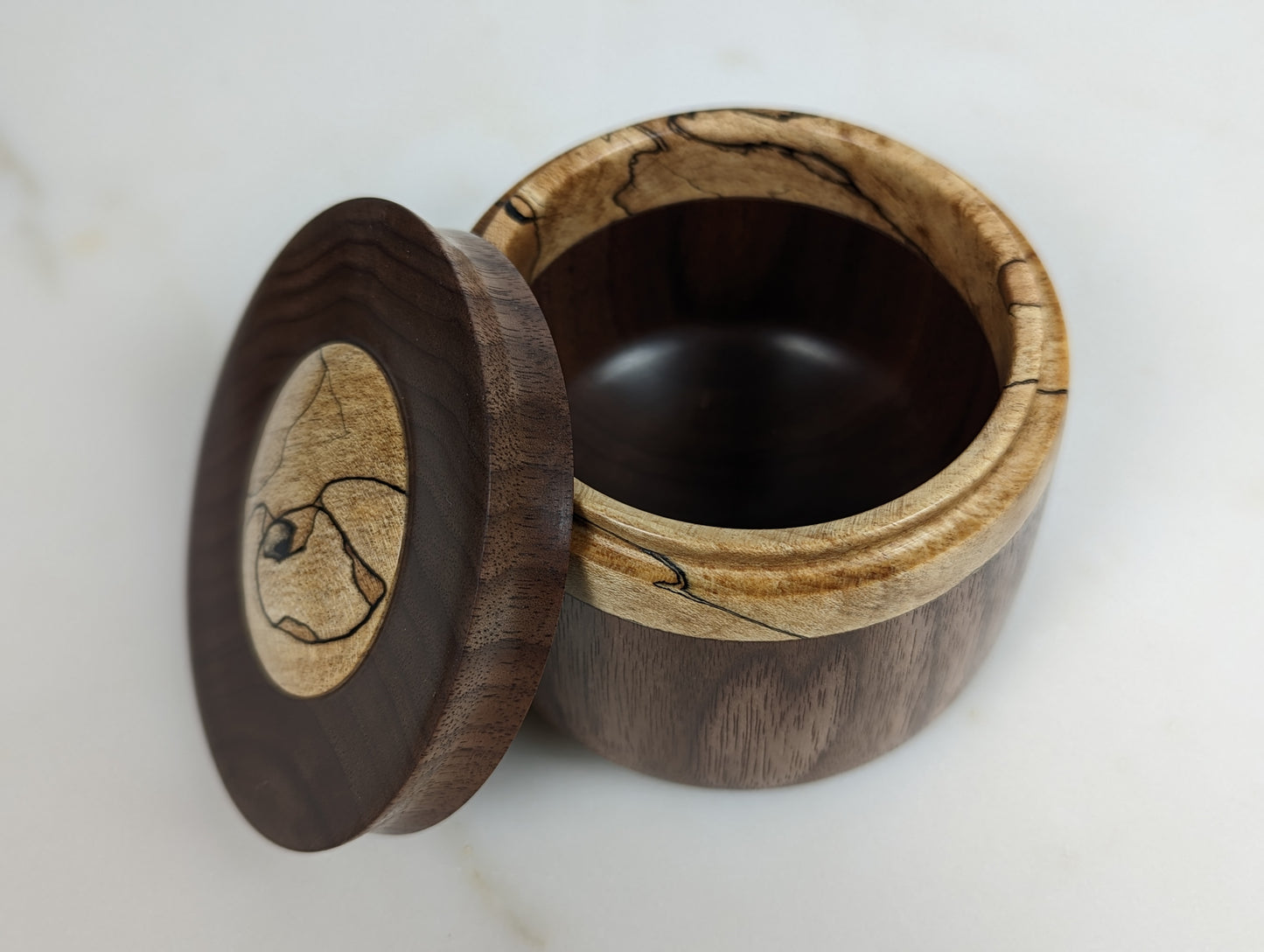 Button topped lidded pot