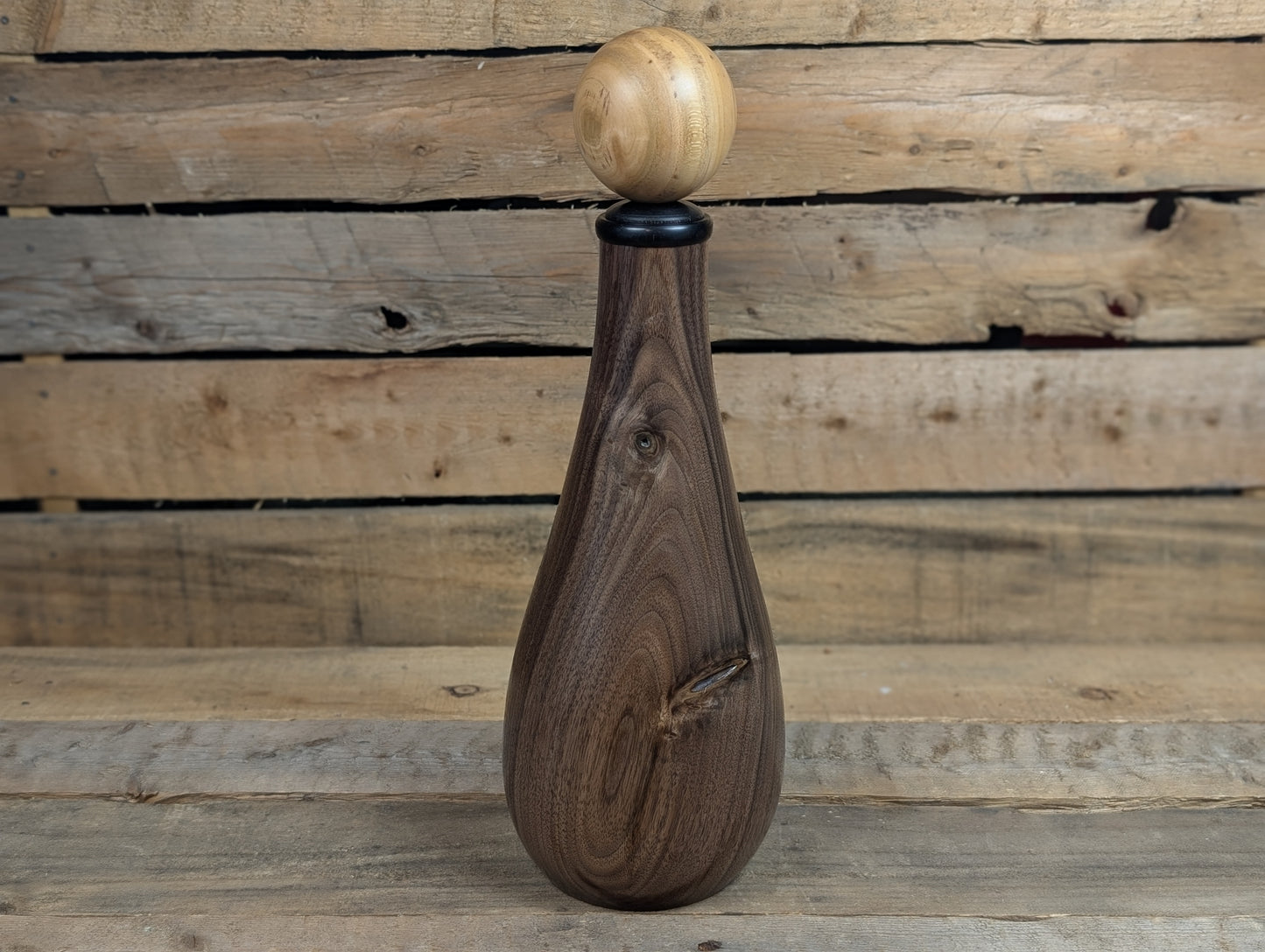 Ball top black walnut bottle