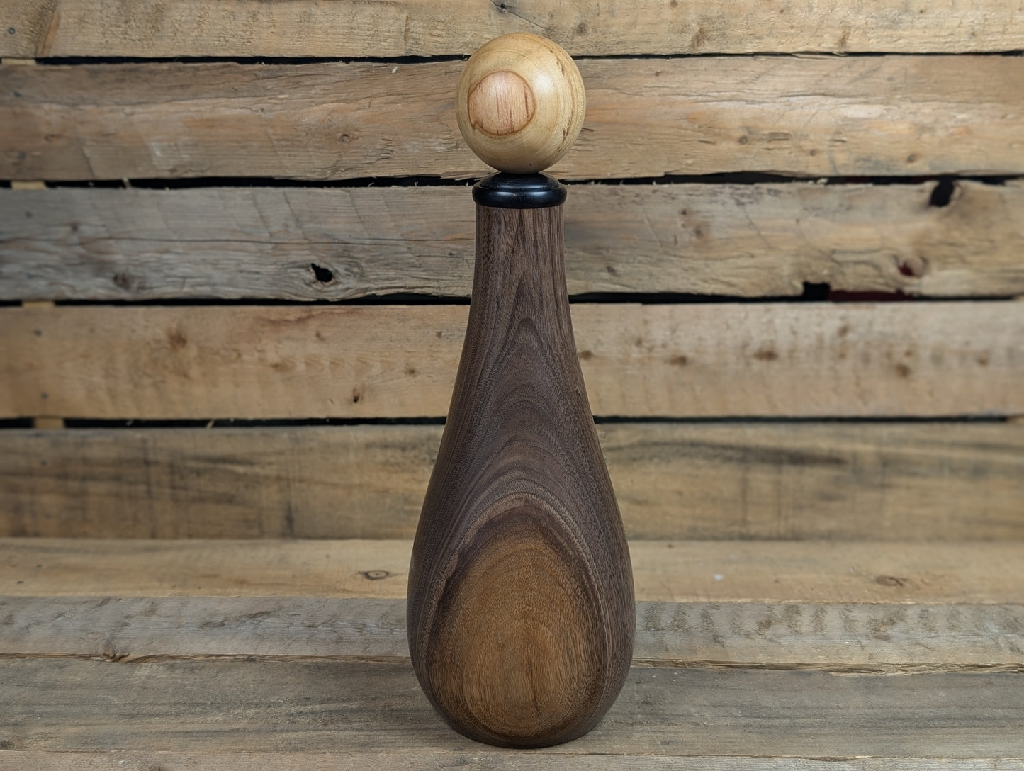 Ball top black walnut bottle