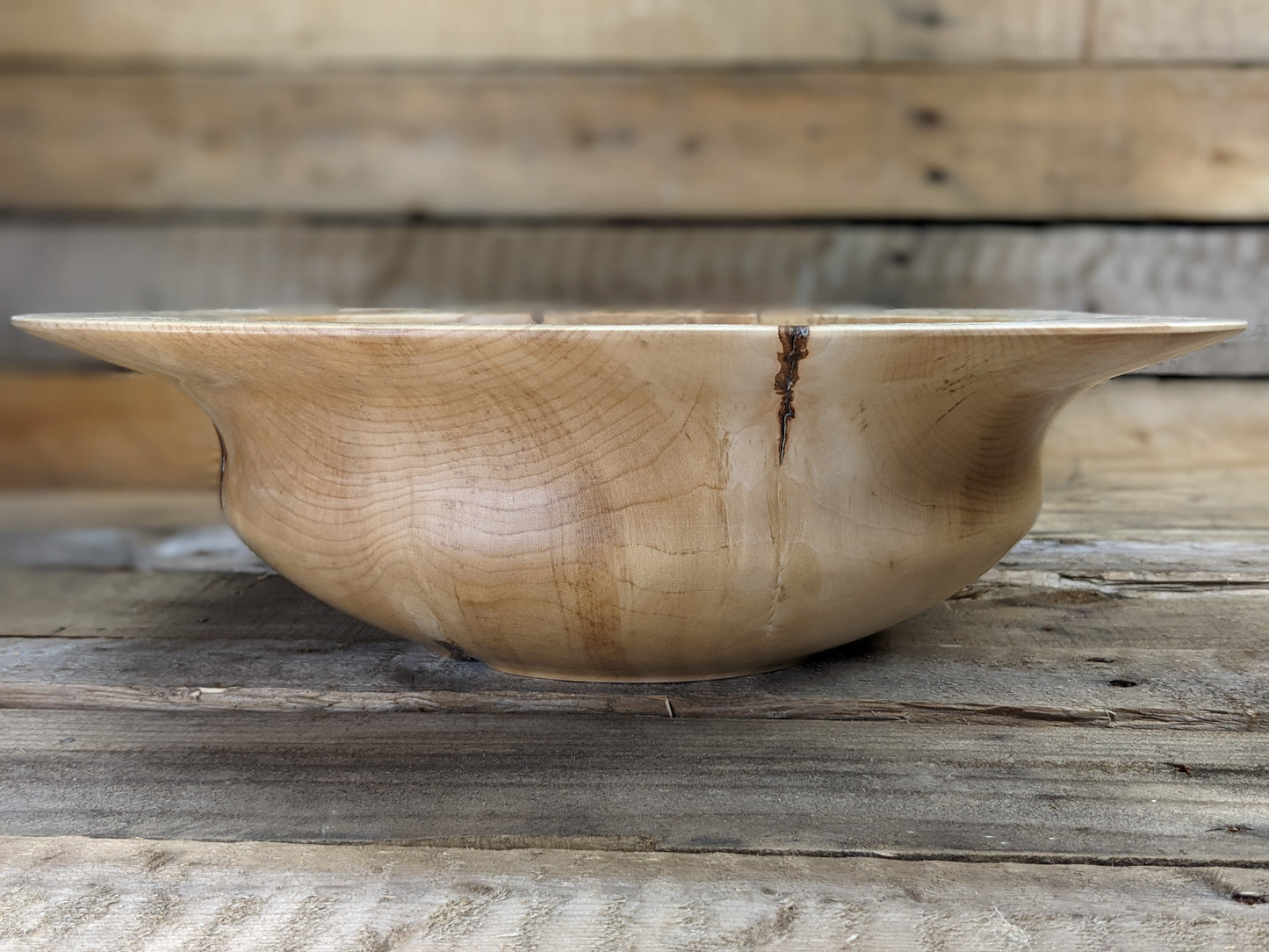 Natural edge wide rimmed bell bottomed bowl